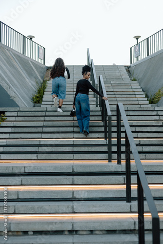 Walking up stairs in a city
