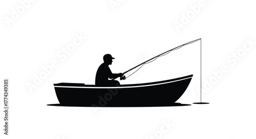 Silhouette of a fisherman in a boat enjoying the quiet waters