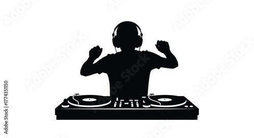 Silhouetted dj playing music with turntables and headphones in a studio