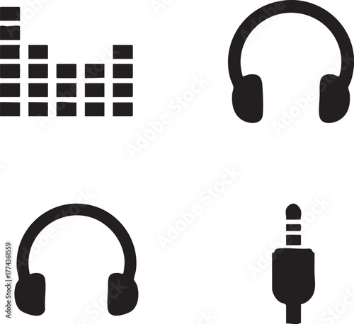 Audio equipment symbols representing sound, headphones, and audio jack arranged on white surface, conveying technology and music.