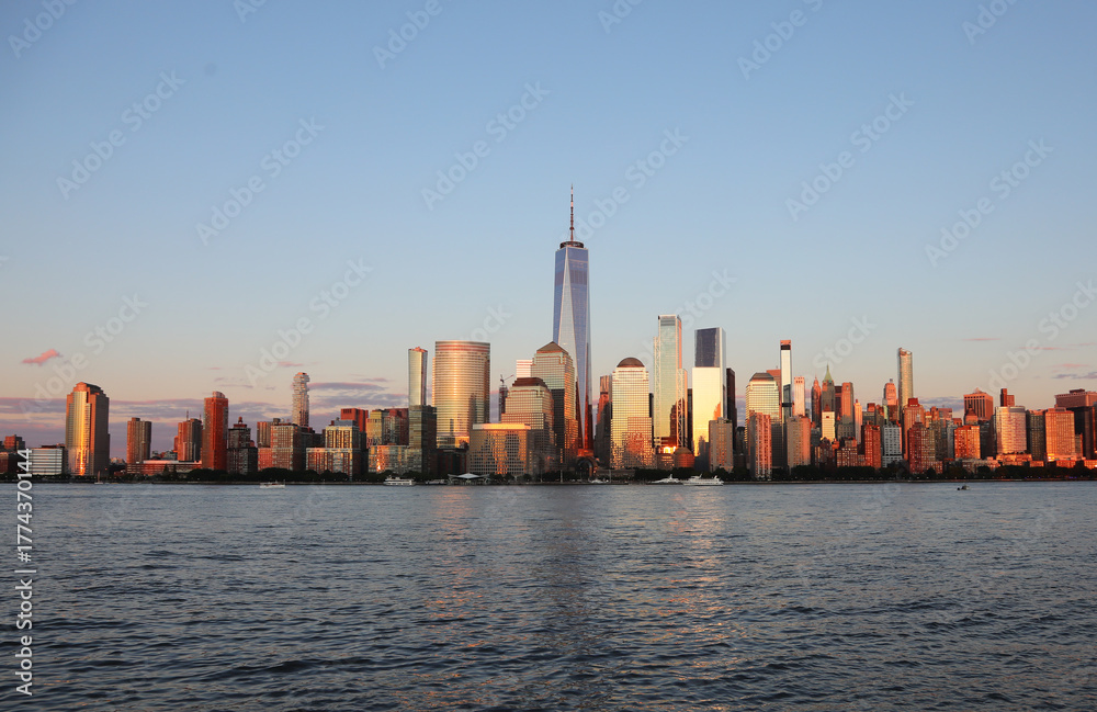 Obraz premium fantastic view of the nyc skyline with towering skyscrapers and the hudson river from new jersey city in USA