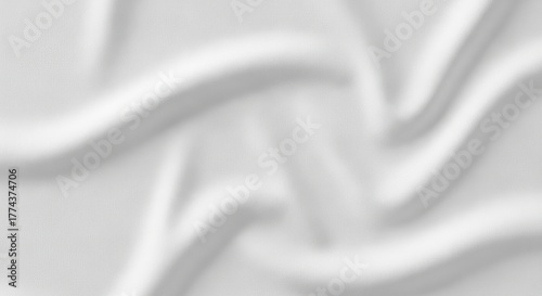 Softly blurred abstract background with flowing white and grey wavy patterns, creating a gentle, ethereal texture.