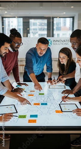 Team Collaboration and Brainstorming Session in Modern Office.