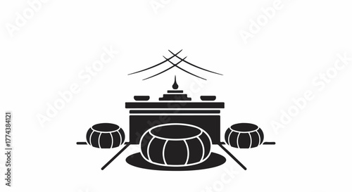 Traditional altar setup for spiritual offering or ceremony with decorative cushions.