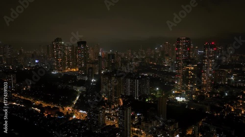 Wallpaper Mural 4K night view of a busy flyover bridge, highway in Mumbai, Skyscraper buildings in Mumbai at night, developing India concept Torontodigital.ca