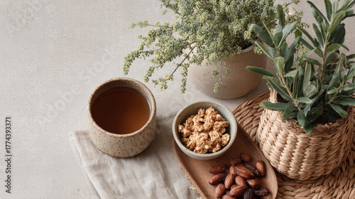 Eco friendly lifestyle flatlay featuring herbal tea, popcorn, dates, and potted plants, creating serene atmosphere