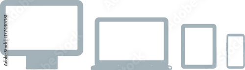 Collection of modern digital devices displaying blank screens on a reflective surface