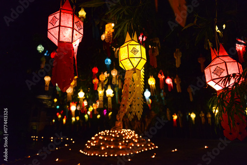 Colorful lanterns glowing at night during the Loy Krathong festival.