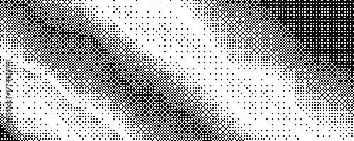 a black and white pixelated pattern creating a gradient effect with dispersed squares