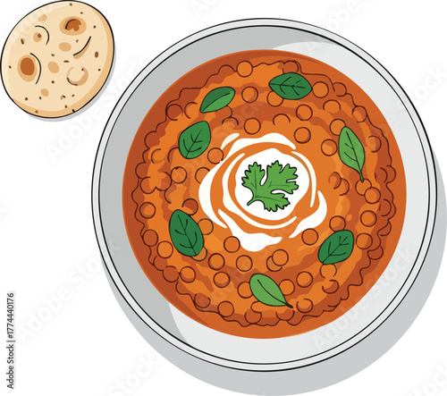 Overhead view of a bowl of Indian chickpea or lentil curry with cream, cilantro, and mint leaves, served with a side of flatbread.