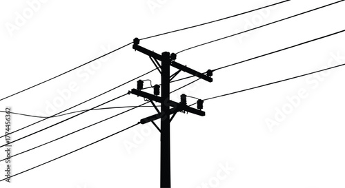 Silhouette of utility pole with power lines, electrical infrastructure, energy distribution, industrial structure, electricity transmission, urban skyline, night contrast, grid network,