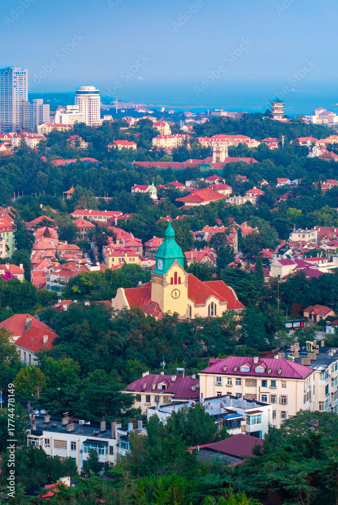 Naklejka premium Urban Environment of Jiangsu Road Christian Church, Qingdao, China