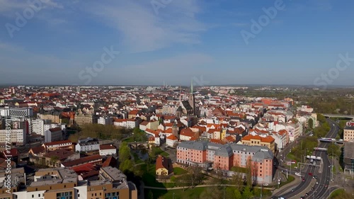 Wallpaper Mural Sweeping Aerial Drone Shot Panning Over Lavicky Park and Gardens, Highlighting the Lush Green Space and Historic Buildings of Pilsen, Bohemia, Czechia. Torontodigital.ca