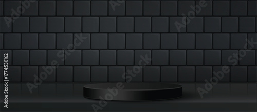 A dark gray, minimalist stage with a textured background and a subtle shadow of a product on the surface.