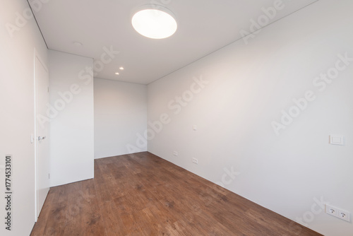 Empty white walls room corner and LED Light. Interior with empty room with white walls and wooden floor.