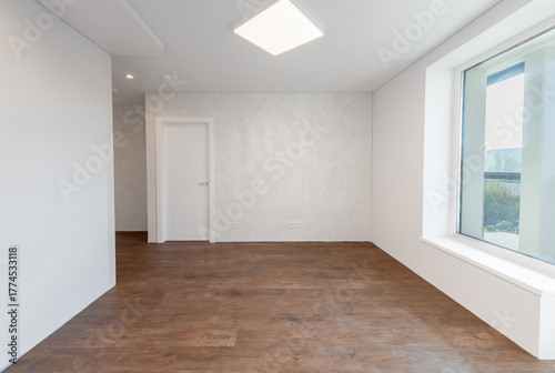 Empty Living Room or Bedroom Interior. White Walls Room Corner and Window. Interior with Empty Room