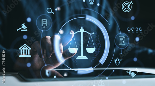 Obraz na płótnie Futuristic justice and legal technology concept with holographic law symbols above a tablet in a digital interface environment on dark background