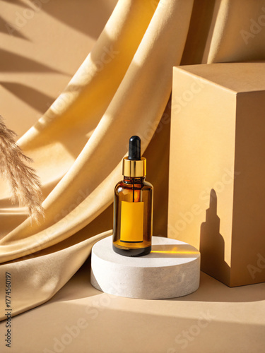 Luxurious Amber Glass Serum Bottle with Gold Dropper on a Pedestal