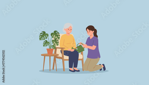 Caretaker assists happy senior woman with watering a houseplant in a comfortable home environment