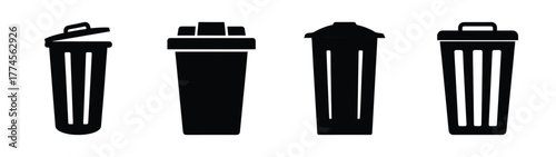 Four diverse black silhouettes of trash cans and recycling bins with different lid styles