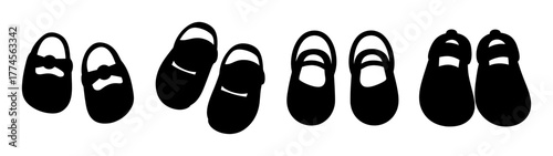 Collection of tiny black baby shoes in various styles ready for little feet