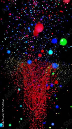 Abstract explosion of colorful particles against a black background