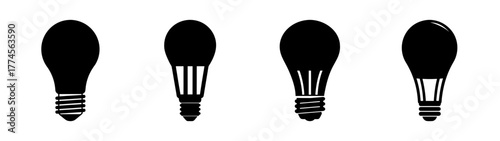 Four distinct black silhouette light bulb icons representing innovation and ideas