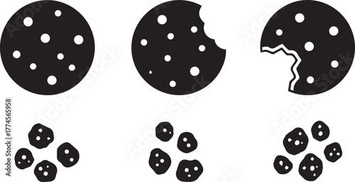 Three black silhouette cookies with white speckles one bitten and scattered cookie crumbs on a white background