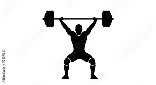 Silhouette of Weightlifter Performing Overhead Barbell Lift