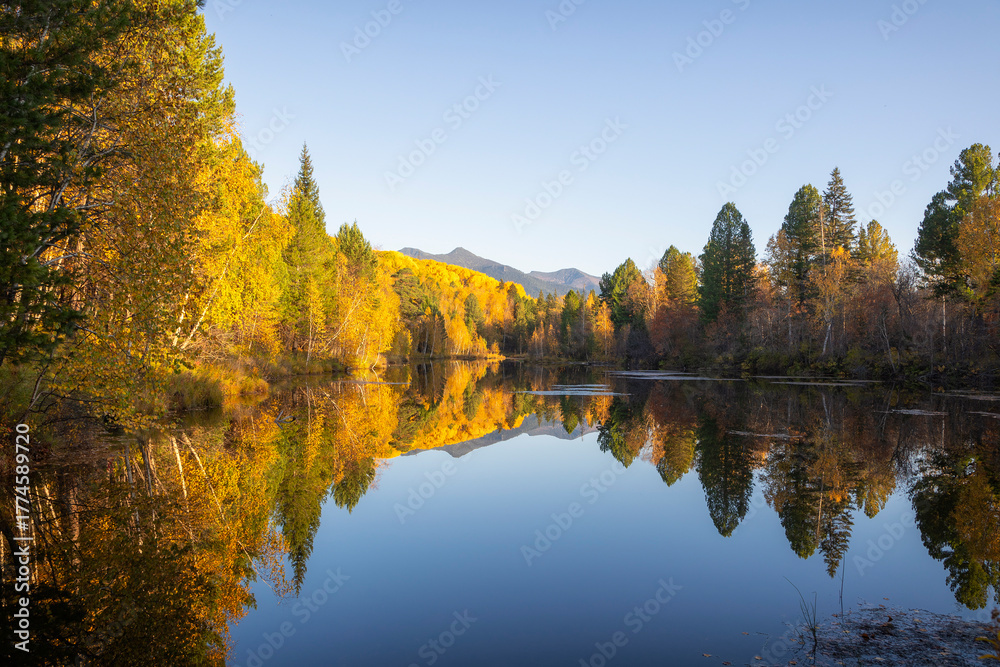 Fototapeta premium Autumn landscape with mountains and a lake. Russia. Siberia.