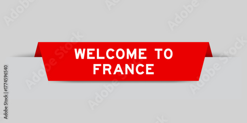Red color inserted label with word welcome to france on gray background