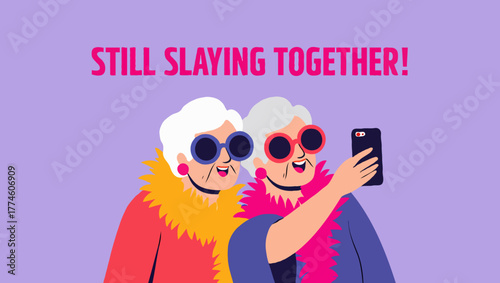 Two grandmothers taking a selfie together, still slaying in style and fashion