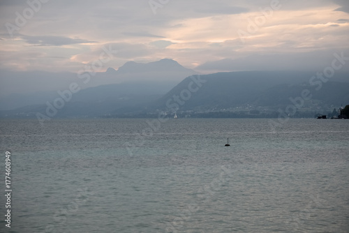 View across the lake on a foggy day as seen from Seewalchen am Attersee in Austria