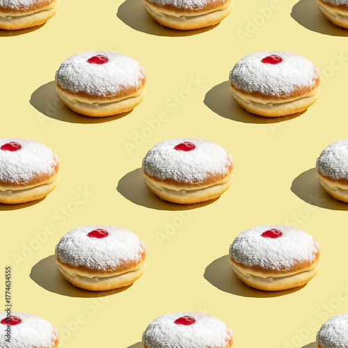 Seamless Pattern of Powdered Sufganiyot with Jam on Yellow Background