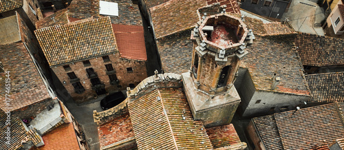 Aerial view of old  houses with terracota rooftops, traditional european village.