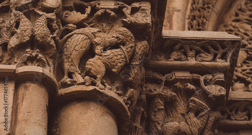 Details of antient medieval architecture with carved stone reliefs.