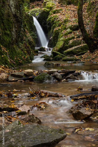 Beautiful Waterfall in Vibrant Autumn Forest