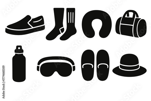 Travel Essentials Icons. Slip-on travel essentials silhouette set: slip-on sneakers, compression socks, neck pillow, duffel bag, water bottle, eye mask, travel slippers, hat.