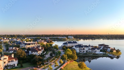 Aerial view of a peaceful  neighborhood with luxurious houses by Woodlands lake , Houston, Texas.