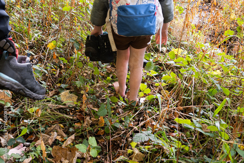 Wilderness exploration - children connecting with nature. Unposed, documentary feel, real life moment