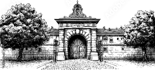 Historic city gate with detailed engraved reliefs and large wooden doors