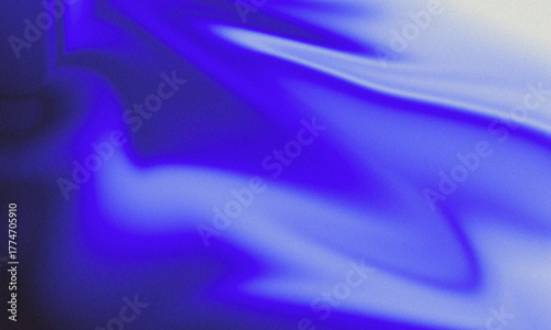 A soft blend of blue tones creates a smooth, grainy background that features gradient effects. The texture adds depth without any clear subject or focal point