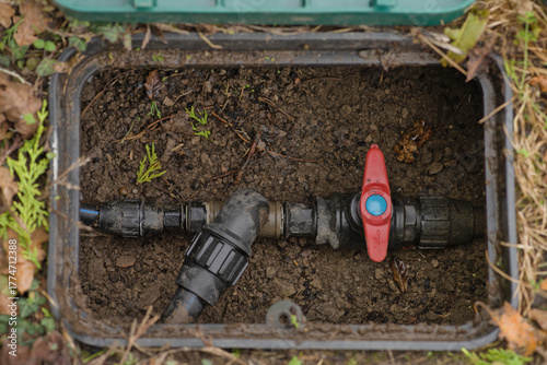 Plastic irrigation valve in a garden control box