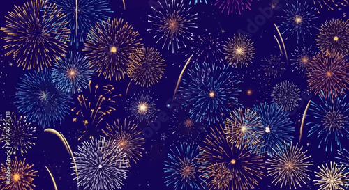 Vibrant fireworks explode across a deep blue night sky, creating a dazzling spectacle of light and color for celebrations and events.