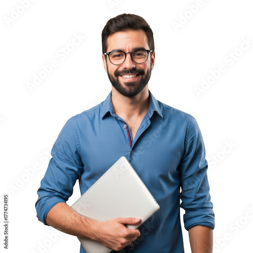 A smiling man with glasses and a beard wearing a blue shirt holds a closed laptop computer isolated on transparent background