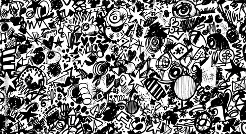 Vibrant chaotic black and white doodle art pattern with stars hearts and abstract shapes perfect for energetic backgrounds and creative projects