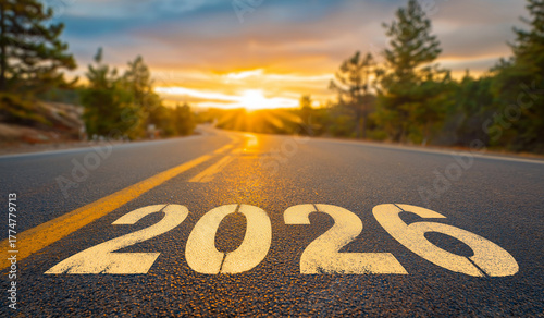 Golden sunset illuminates 2026 painted on a road, symbolizing a bright future, new year goals, and successful journey ahead in the coming years