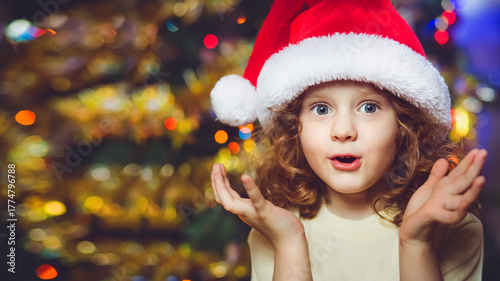 Beautiful little girl in Santa hat