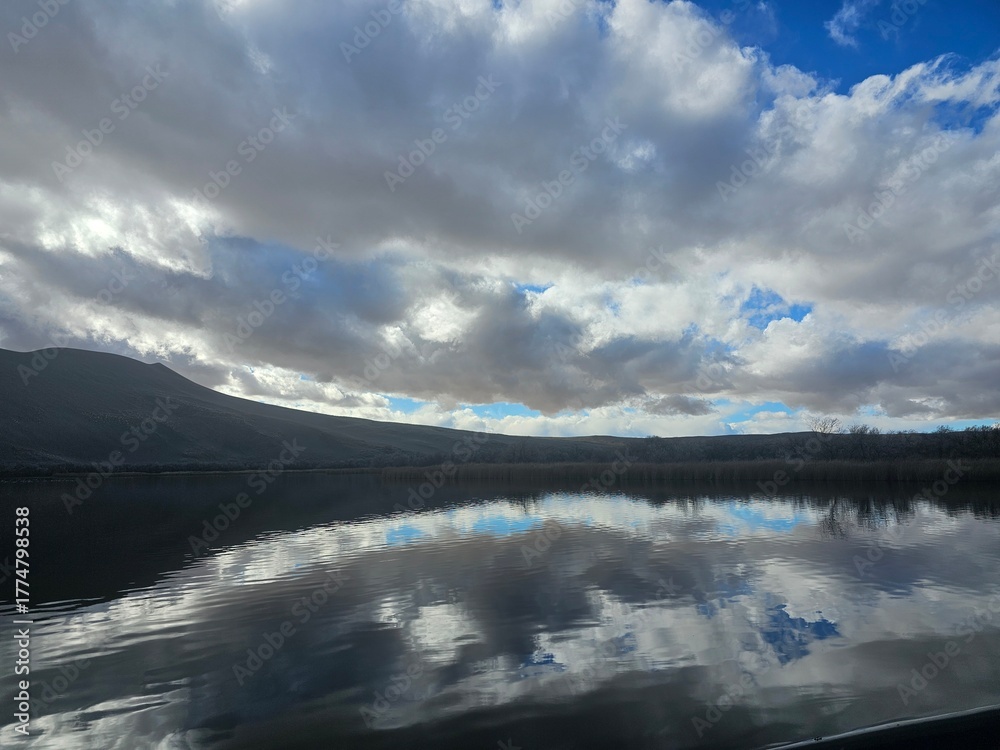 Fototapeta premium clouds over lake