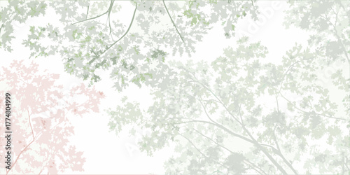 Soft focus view of delicate tree branches with pale green and pink leaves against a white sky